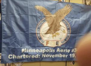 blue flag with an eagle in the middle